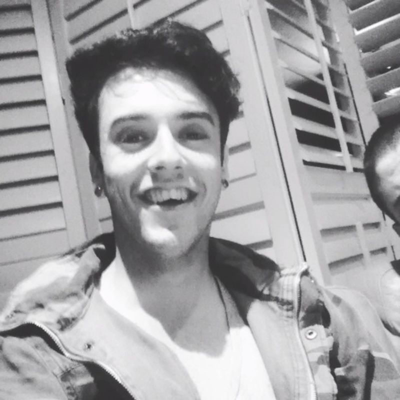 Grainy black and white selfie of a young Harry Hope grinning