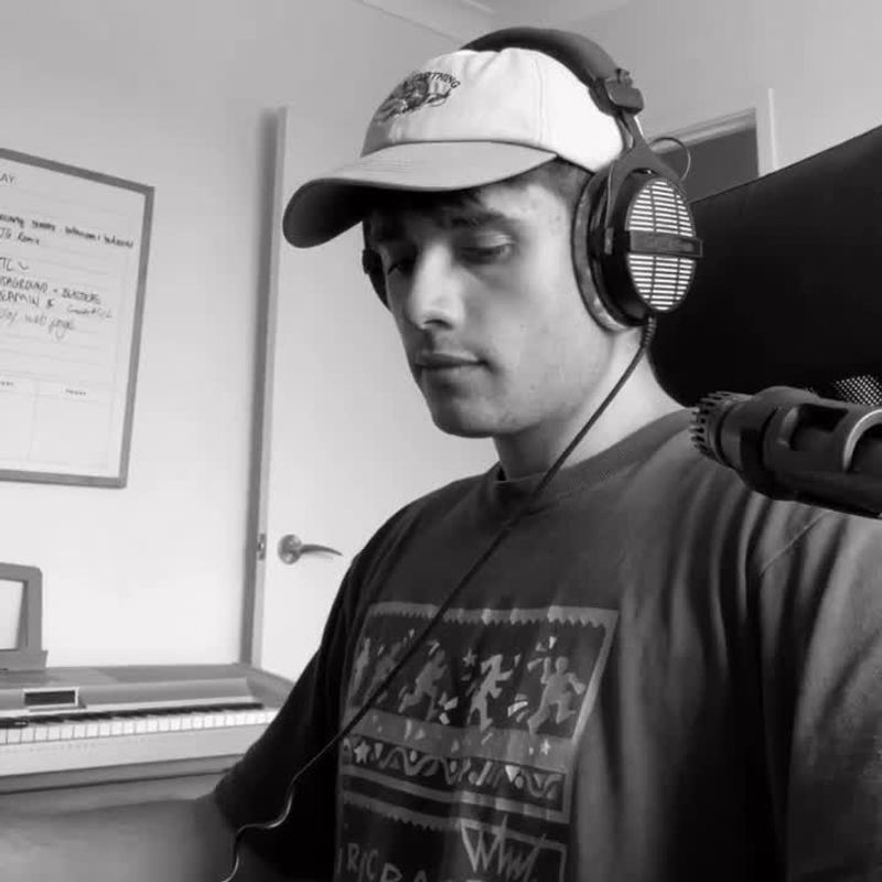 Black and white shot of Harry Hope producing at his home studio desk